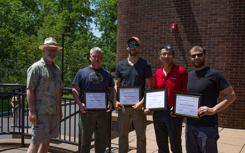The CLASSE Vacuum Group is recognized at the CLASSE Summer Picnic. Left to right, CHESS Director Joel Brock, Vacuum Group: Brian Kemp, Peter McKay, Yulin Li, and Mike Palmer 
