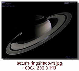 [Saturn's rings casting shadows]